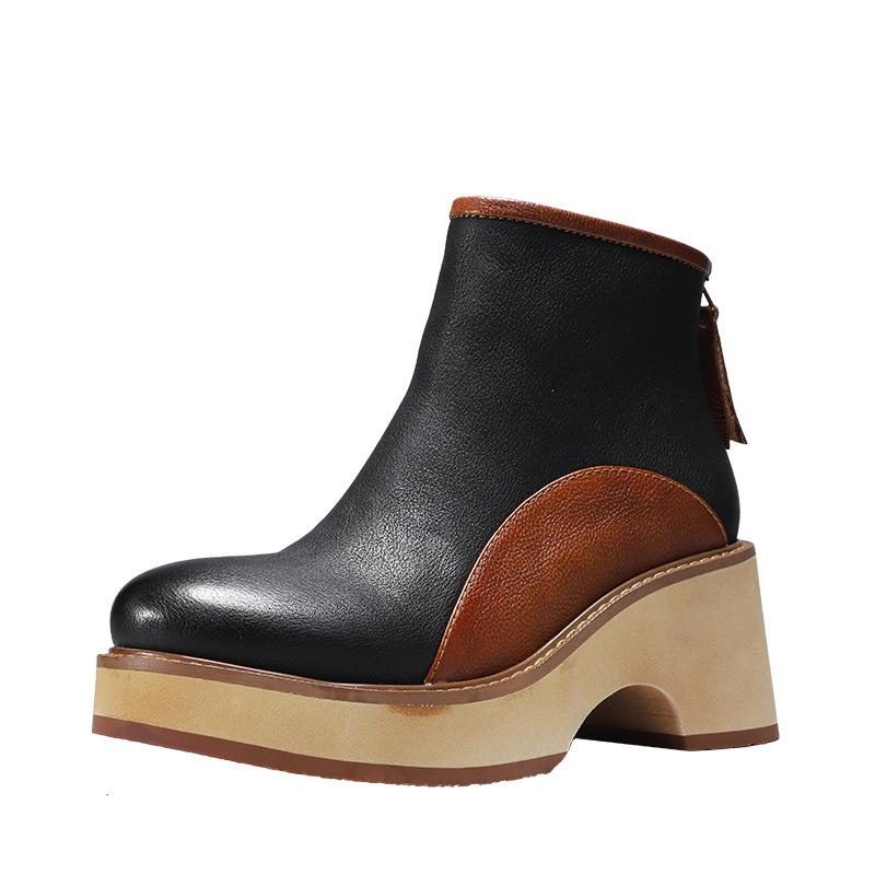 Frauen-weinlese-herbst-dicke Slipsole-stiefel